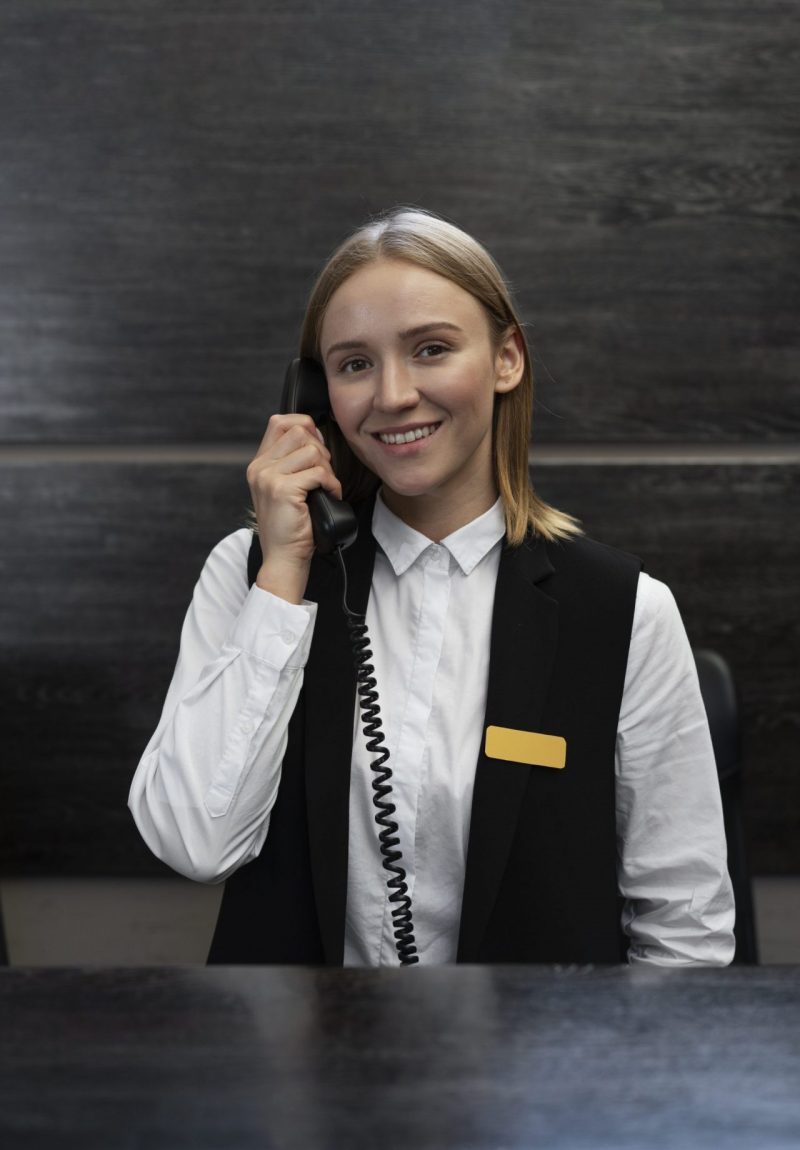 female-receptionist-elegant-suit-during-work-hours (1)
